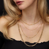 14K Gold 2.1mm Paperclip Chain on woman's neck